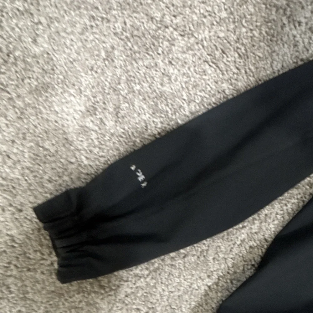 The North Face Black Softshell Jacket Full Zip Stand-Up Collar Mid-Length Men's